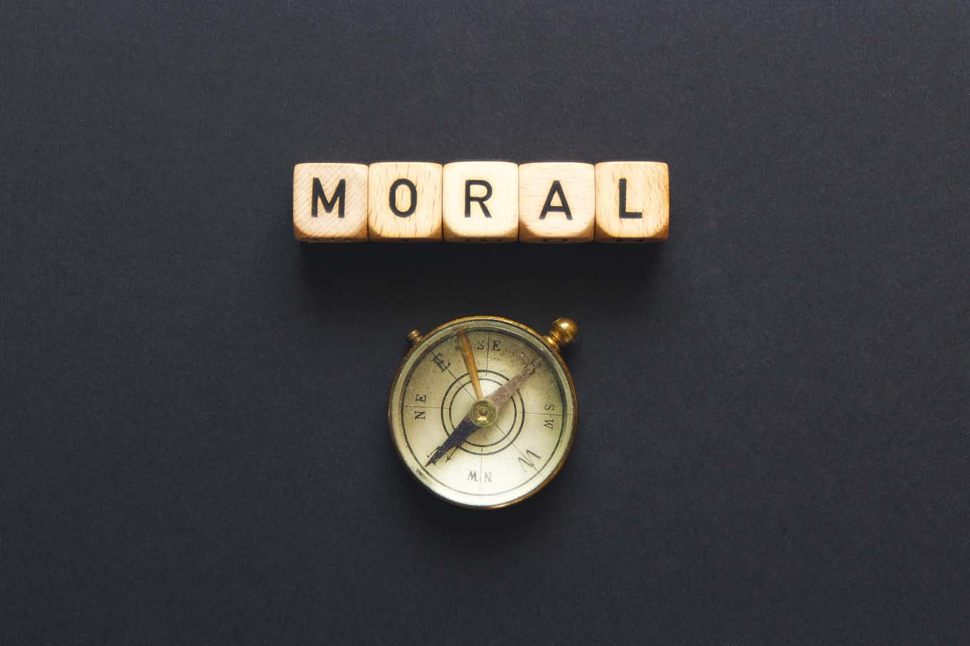 word moral and compass under it